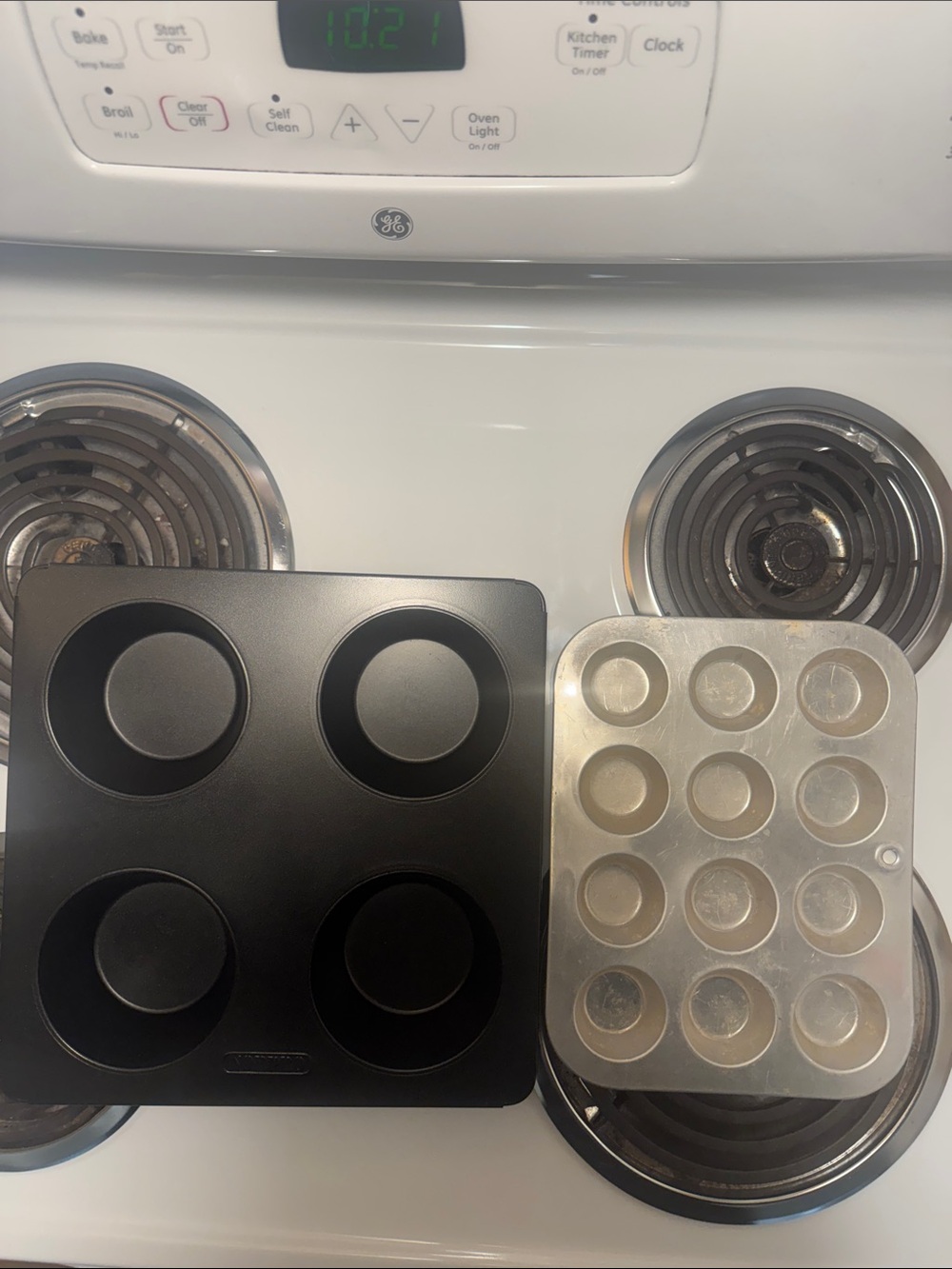 Two muffin pans, the large one is non-stick and NWOT. Small one is in GUC.